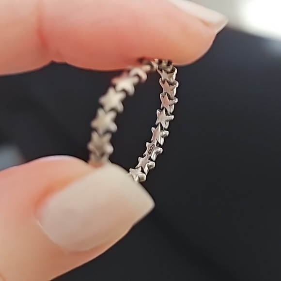 Sterling silver ring with stars all the way around the band. Infinity star band - Picture 4 of 4